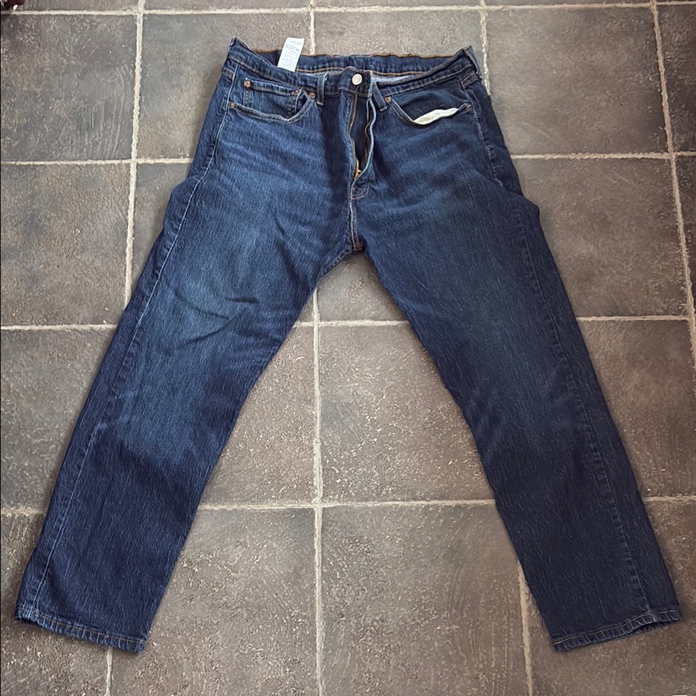 Blue Straight Jeans with Five Pocket Design and Subtle Fading